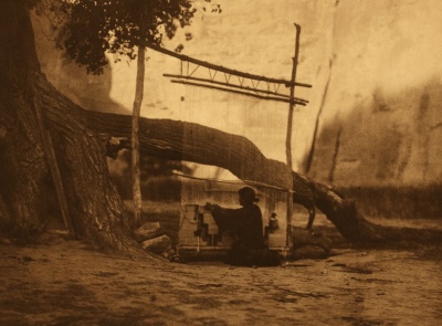 The Blanket Weaver, photo by Edward Curtis, public domain