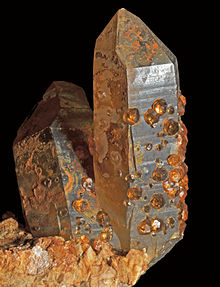 Spessartine sur quartz fumé.jpg